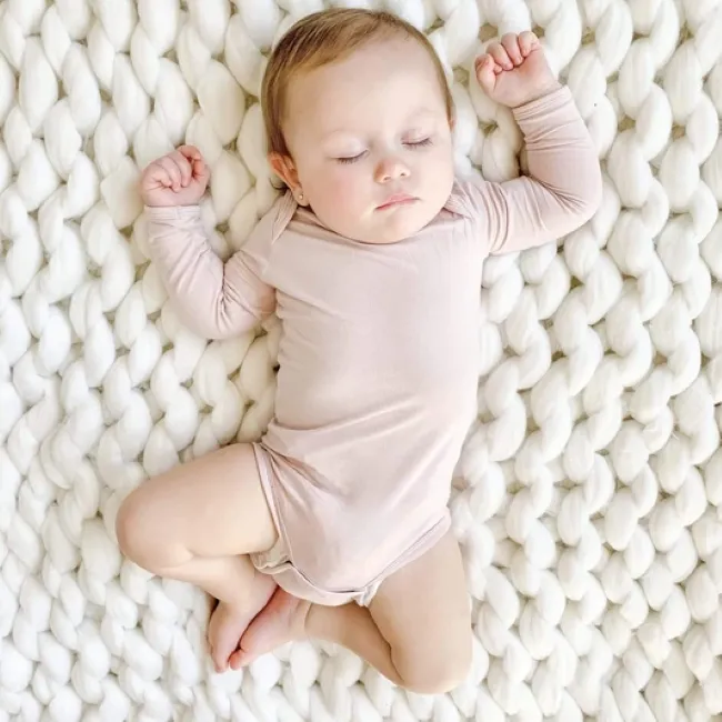 Kyte Baby Long Sleeve Bodysuit in Blush